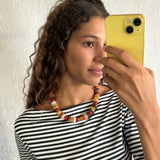 a lot going on red necklace